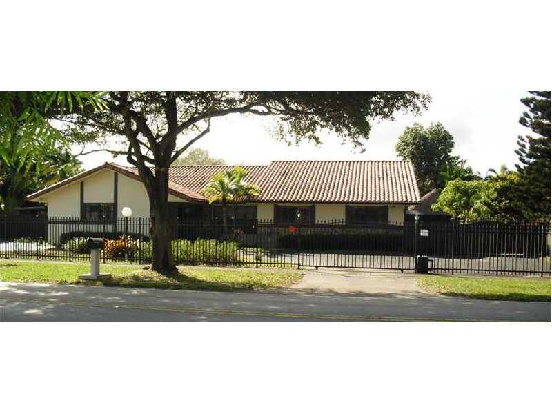 Great location.1 Story home.4x2+1/2.Features: formal living & dining with tray ceiling & pool view. Very functional entertaining family room next to the gourmet kitchen with incorporated dining area. Office room/ playground custom furniture made. Master's with amazing his/her walking closets. Garage for 8 +cars. Beautiful additional outside terrace & living space around the pool. Tiki Hut & BB&Q in your backyard with fruit trees.2 new A/C. + Shutters around.Living Area 3,117 Sqft and LOT SIZE 16,554 Sqft.