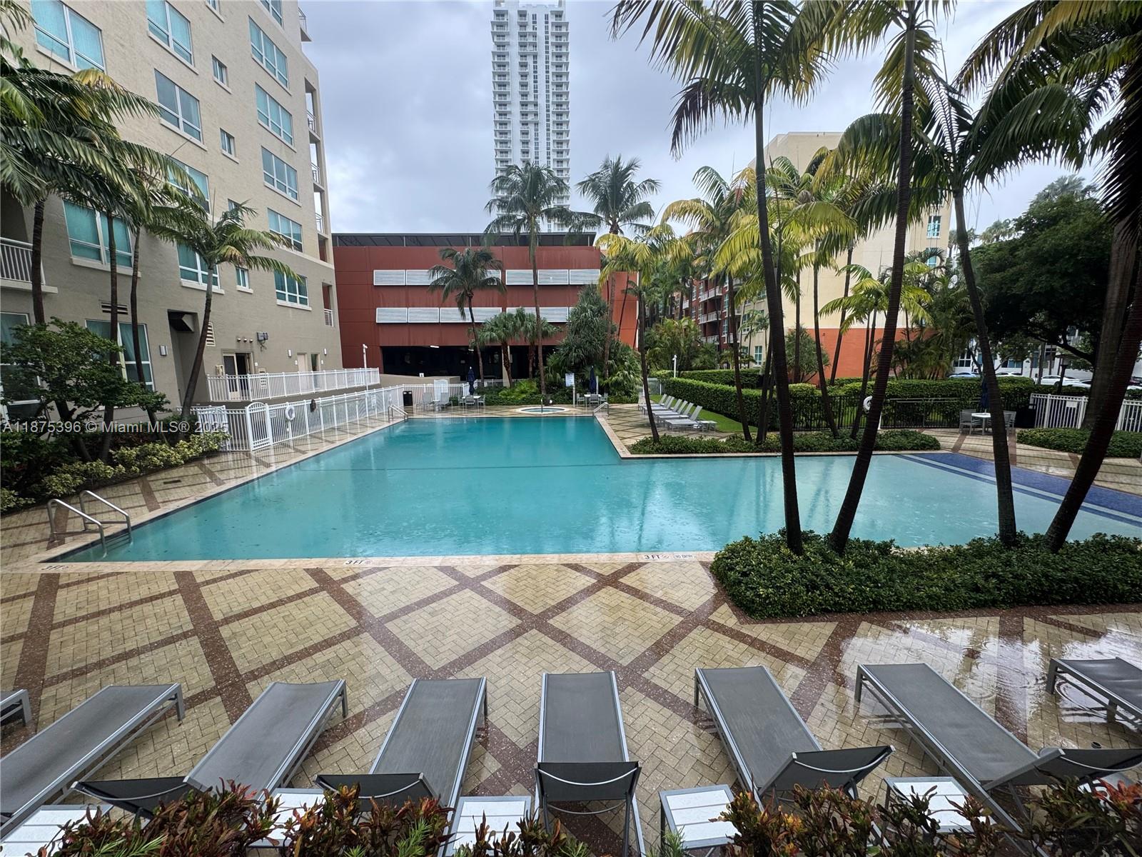 Spacious loft-style 1BD/1BA at Cité on the Bay featuring soaring 14’ ceilings, open layout, and private balcony with partial bay views. Unit offers a modern kitchen, in-unit washer/dryer, and one assigned garage space. Resort-style amenities include beach-entry pool, jacuzzi, fully equipped fitness center, club room, business lounge, 24/7 concierge, valet, and security. Located in the heart of Edgewater, directly across from Margaret Pace Park and minutes to Wynwood, Downtown, Brickell, and Miami Beach.