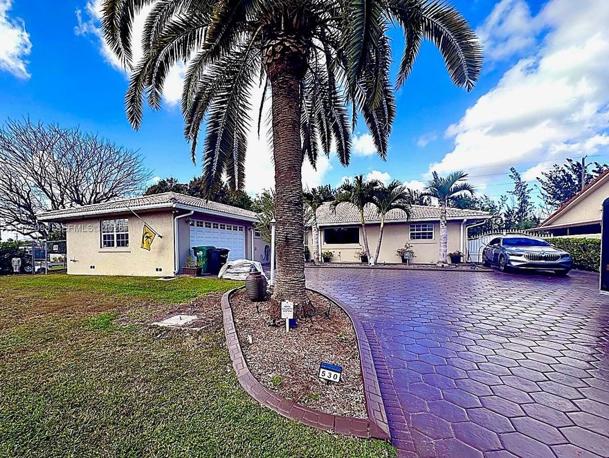 Lovingly maintained by its original owners for over 30 years, this canal-front home is hitting the market for the very first time. Located in a quiet, established neighborhood, the property offers a spacious layout, a large driveway with ample parking, and a generous backyard with plenty of room to add a pool. Enjoy peaceful water views and endless potential to make this well-cared-for home your own.