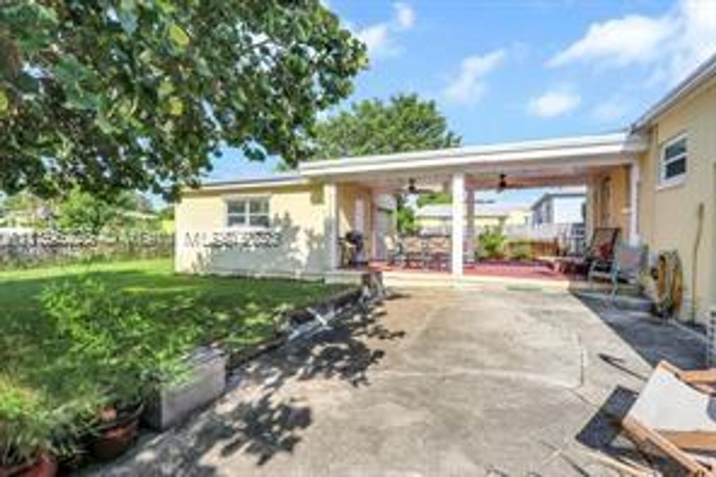 Photo of Lake Park, FL 33403 (MLS # A11396226)