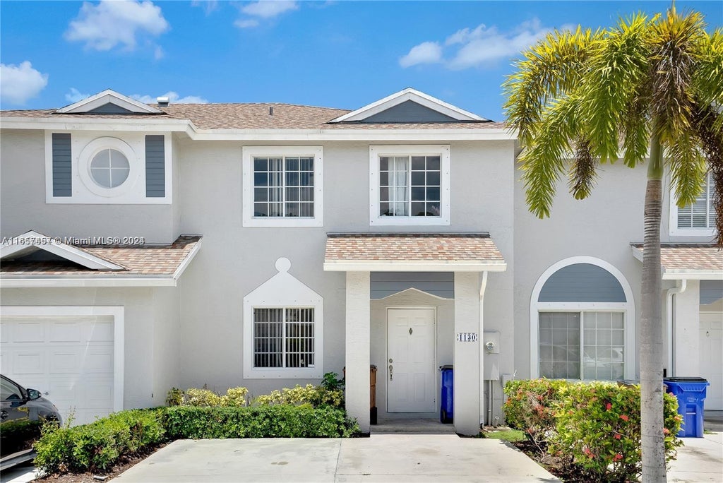 Photo of 1130 SW 44th Way, Deerfield Beach, FL 33442 (MLS # A11657457)
