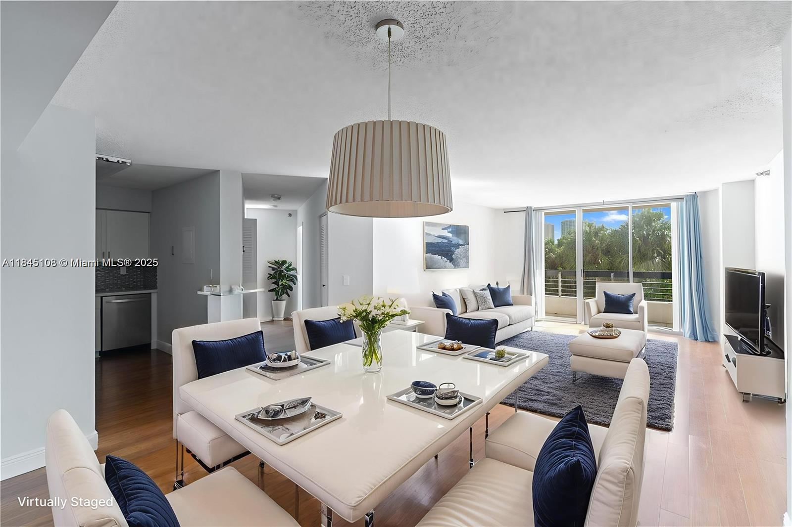 Beautifully renovated 2-bedroom, 2-bath condo with peaceful and private views in Aventura. This spacious condo features an open-concept kitchen with stainless steel appliances—ideal for both daily living and entertaining. Contemporary flooring throughout. The primary suite includes a walk-in closet and an updated bathroom with dual vanities and a bathtub. The second bedroom offers space for two beds or a queen and has direct access to the private balcony. The Hurricane shutters provide peace of mind. In-unit washer/dryer and same-floor assigned parking—no need for elevators after shopping or errands. Resort-style amenities include a fitness center, tennis, pickleball, pool, barbecue area. Ideally located near houses of worship, Aventura Mall, schools, the beach, and intl airports.