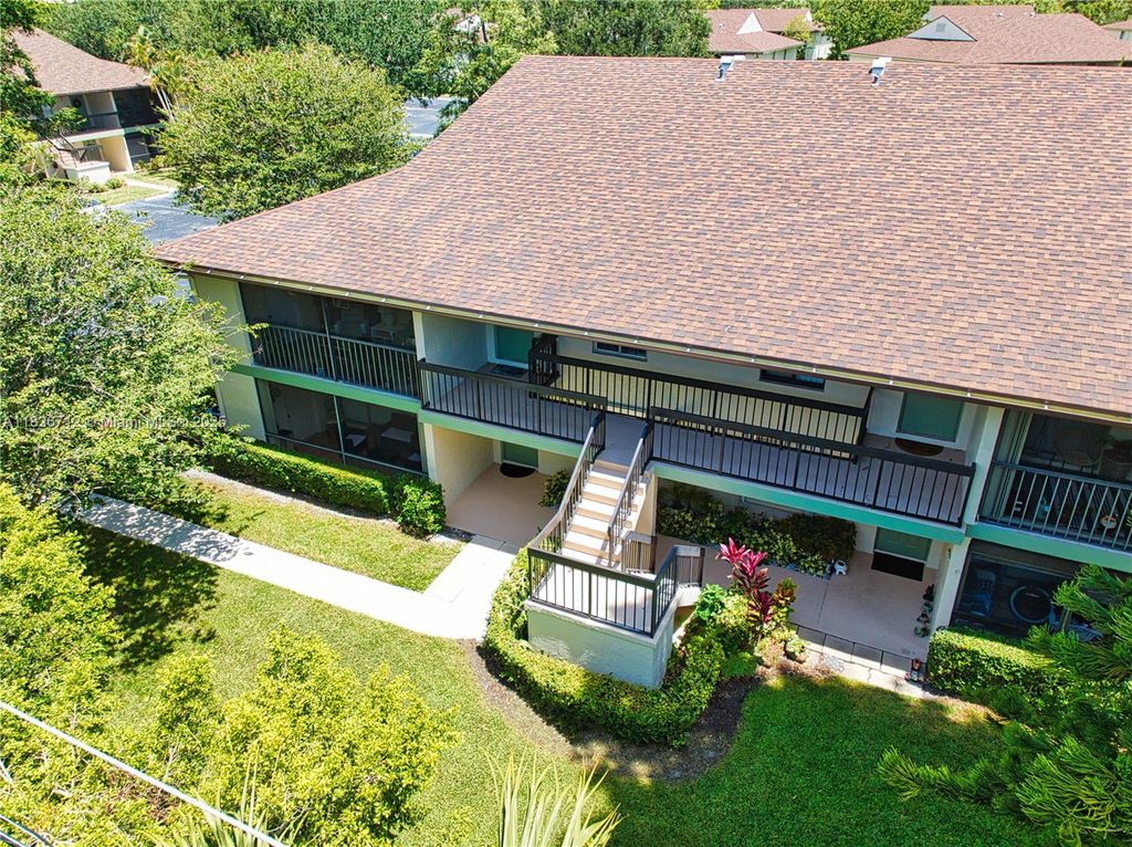 Photo of 6286 Chasewood Dr #G, Jupiter, FL 33458 (MLS # A11826712)