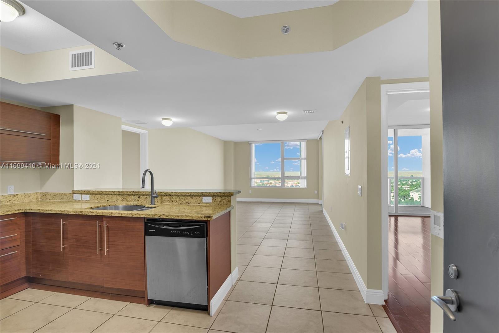 TAO SAWGRASS CONDOMINIUM - Residential