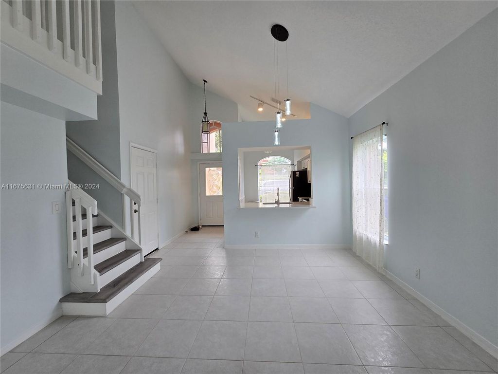 Photo of 1051 Via Jardin, Riviera Beach, FL 33418 (MLS # A11675631)