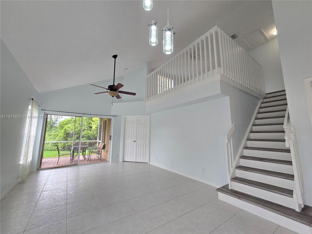 Photo of 1051 Via Jardin, Riviera Beach, FL 33418 (MLS # A11675631)