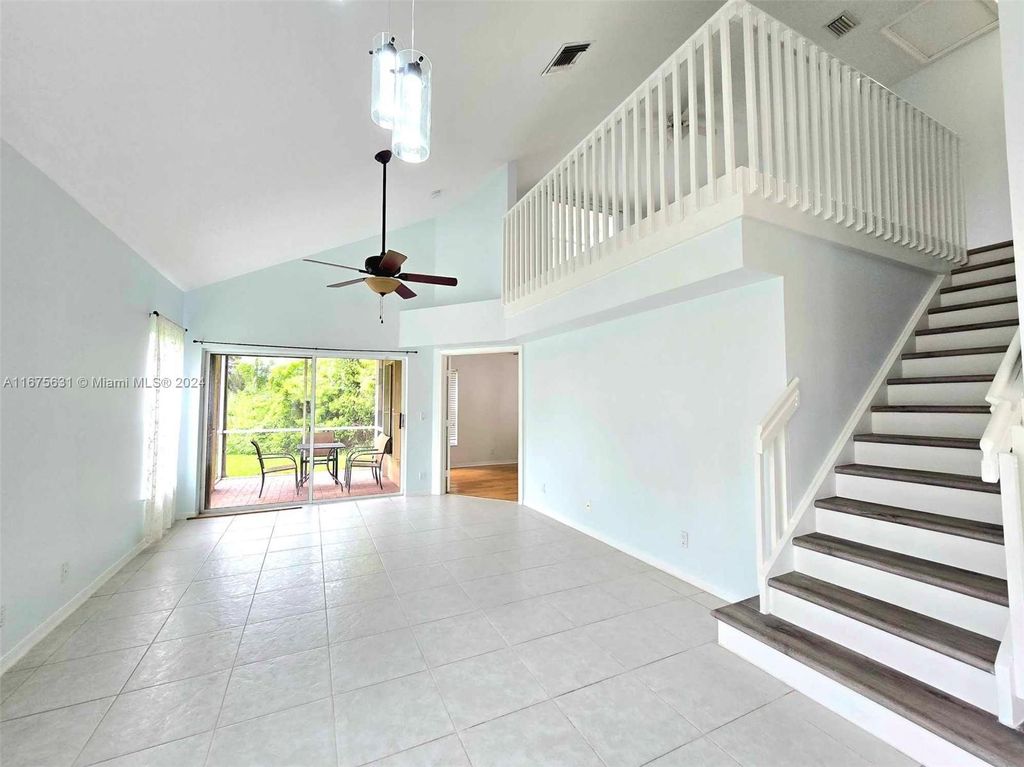Photo of 1051 Via Jardin, Riviera Beach, FL 33418 (MLS # A11675631)