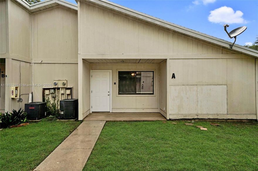 Townhouse in Bella Lago qualifies for FHA or Conventional Financing,  2-bedroom, 1-bath townhouse located in the desirable gated community of Bella Lago. This home features laminate flooring throughout, white appliances, and convenient washer and dryer hook-up. Enjoy natural light from the skylight and the ease of plenty of guest parking. Ideally situated close to shopping, the Turnpike, and beautiful beaches.