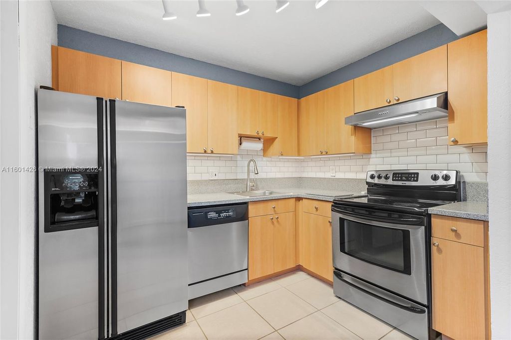 Photo of 4791 NW 9th Dr #4791A, Plantation, FL 33317 (MLS # A11601426)