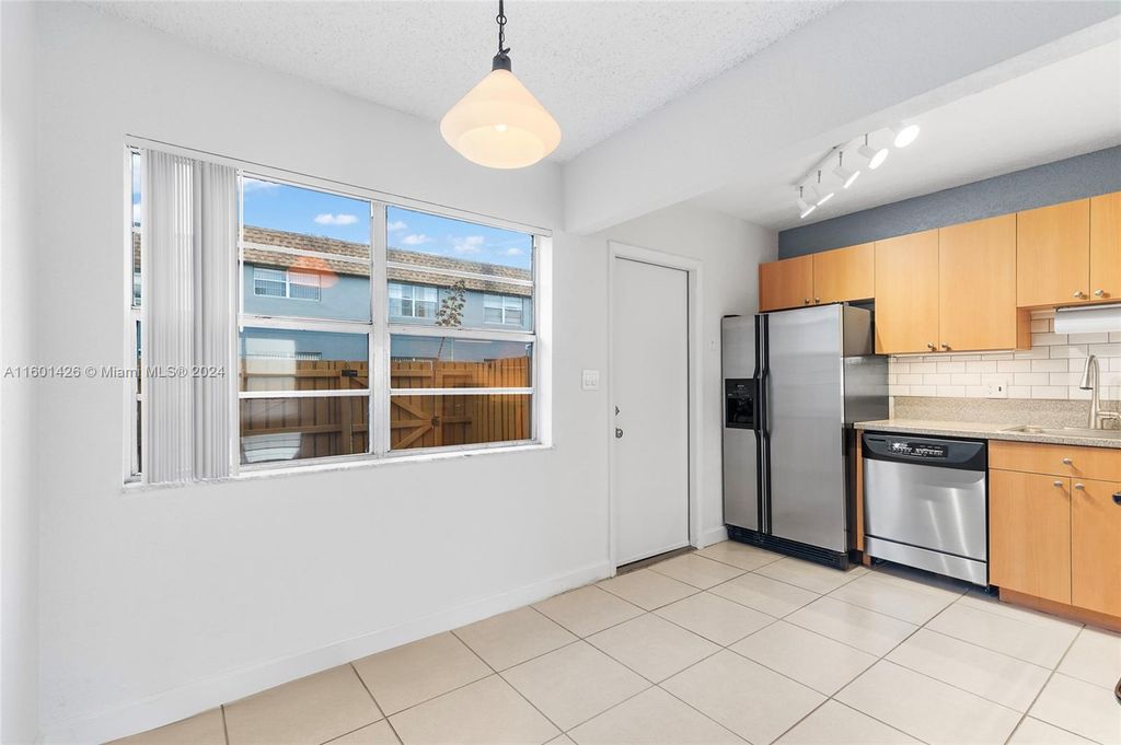 Photo of 4791 NW 9th Dr #4791A, Plantation, FL 33317 (MLS # A11601426)