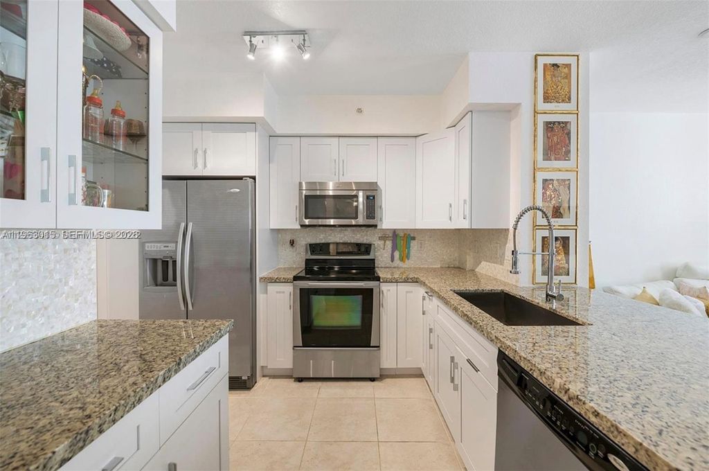 Photo of 1830 Radius Dr #1022, Hollywood, FL 33020 (MLS # A11963015)