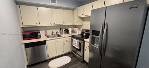 Photo of 13500 SW 1st St #302U, Pembroke Pines, FL 33027 (MLS # A11887554)