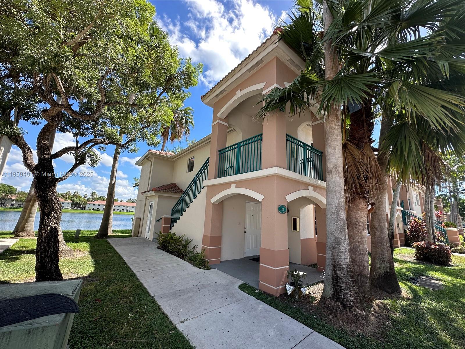 Second floor, corner unit, in gated community, with lake view, near Homestead Senior High School, the Florida Keys Shopping Outlets, the Homestead Speedway, and the Baptist Health Homestead hospital. This condo features tile and laminated wood floors, kitchen and laundry appliances, assigned parking, and plenty of guest parking. The condo has a lake view from the kitchen and master bedroom. Amenities include a community pool, security patrol, monitored entry, and maintenance of the common areas. Electricity is provided by FPL, and water by Homestead. Association approval is required. The association allows only 3 vehicles per unit. No commercial vehicles are allowed.
