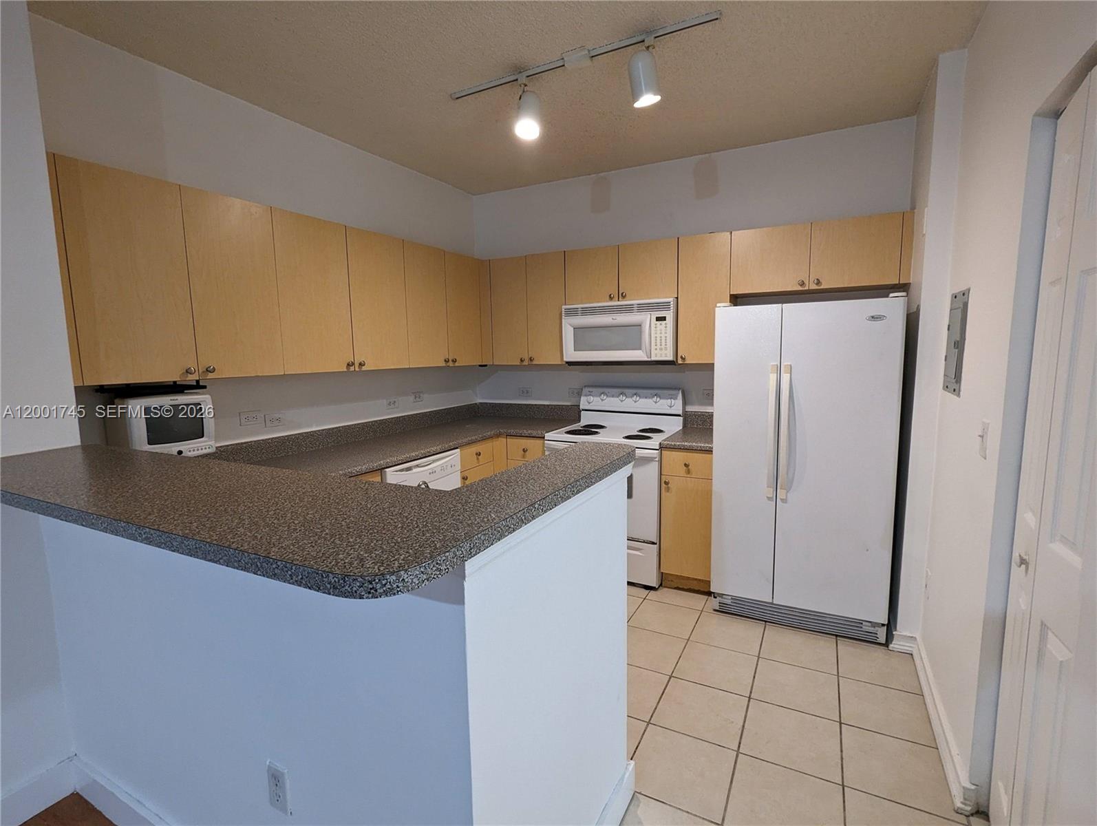 EL-AD RESIDENCES AT MIRAM - Residential Lease