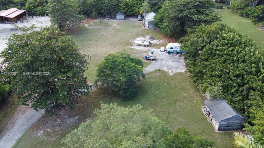 Location, location, location. This property offers an amazing development opportunity in Homestead. With an expansive 1.16 acre property that allows endless possibilities from an agricultural farm, with horse stables currently on the property it can become a ranch or a custom dream home. The potential of this property for a savvy investor or developer is endless. With its amazing accessibility while maintaining quiet serene charm it is difficult to find another property like this.