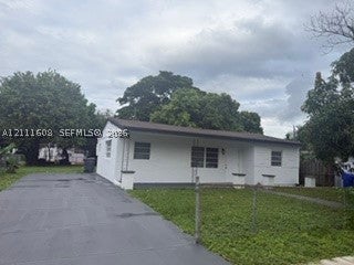 Photo of 6311 Flagler St, Hollywood, FL 33023 (MLS # A12111608)