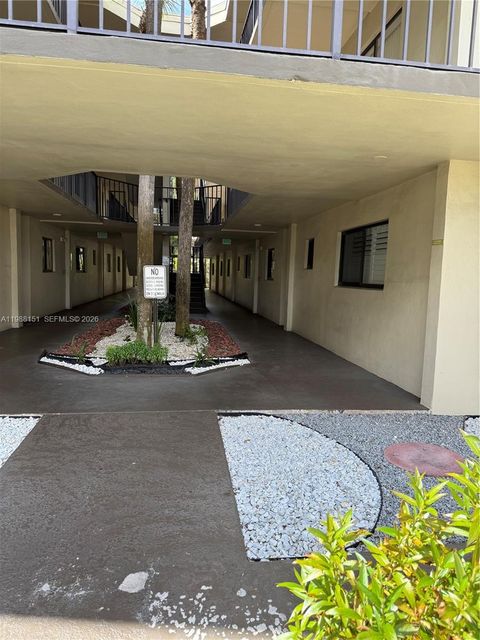 Photo of 5130 Las Verdes Cir #123, Delray Beach, FL 33484 (MLS # A11988151)