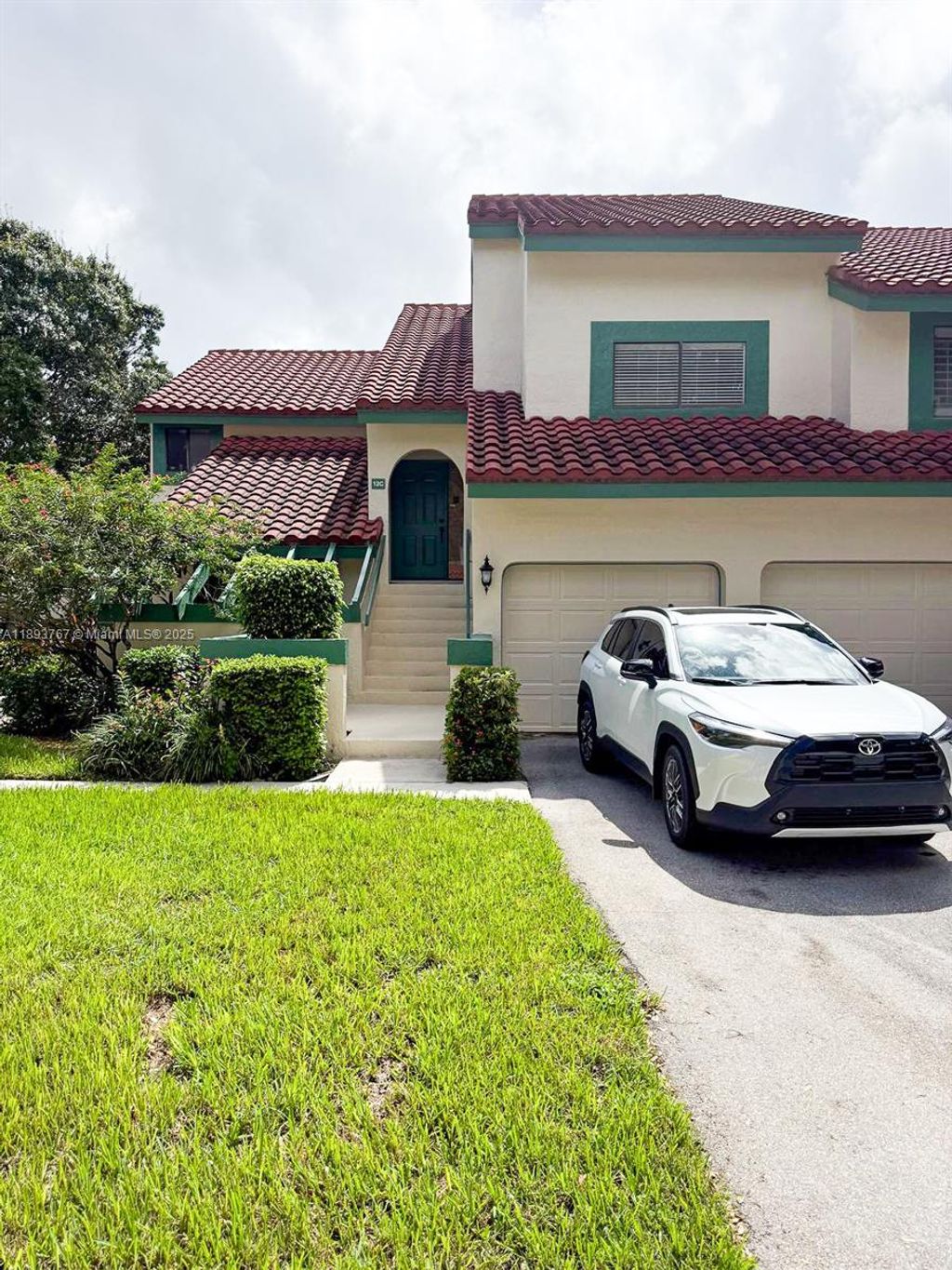 Photo of 12 E Lexington Ln E #C, Palm Beach Gardens, FL 33418 (MLS # A11893767)