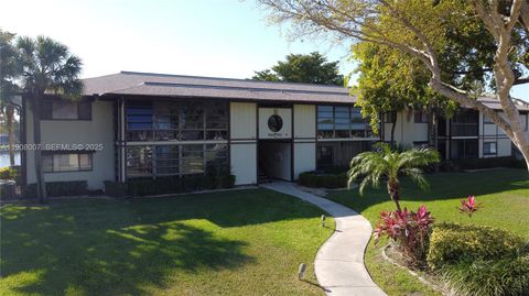 Photo of 9503 W Mcnab Rd #201, Tamarac, FL 33321 (MLS # A11908007)