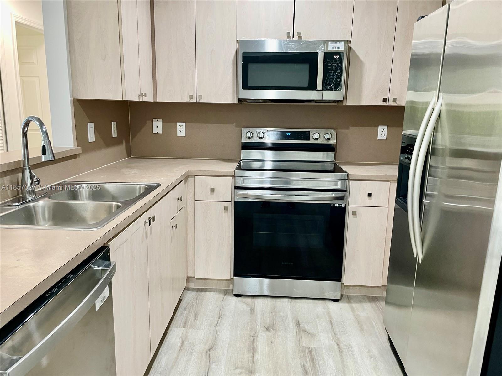 BE THE FIRST ONE TO ENJOY THIS 2 BED , 2 BATH TOTALLY RENOVATED APARTMENT WITH NEW FLOOR, APPLIANCES, KITCHEN AID REFRIGERATOR, BATHROOMS, NEW SINK AND TOILETS, NEW DRAPES, NEW BLINDS WINDOWS AND MORE. IT IS LOCATED ON THE 2ND FLOOR IN A GATED COMMUNITY WITH 24 HOURS SECURITY SERVICES. 2 RESERVED PARKING. THE COMMUNITY OFFERS EXCELLENT AMENITIES, A RELAXING POOL, PLAYGROUND AND A CLUBHOUSE. BEST LOCATION WITH A+ SCHOOLS, CLOSE TO MAIN ACCESS WAYS, SHOPPING CENTERS, MALL, ATC DON'TT MISS THIS OPPORTUNITY! IT WON'T LAST.
