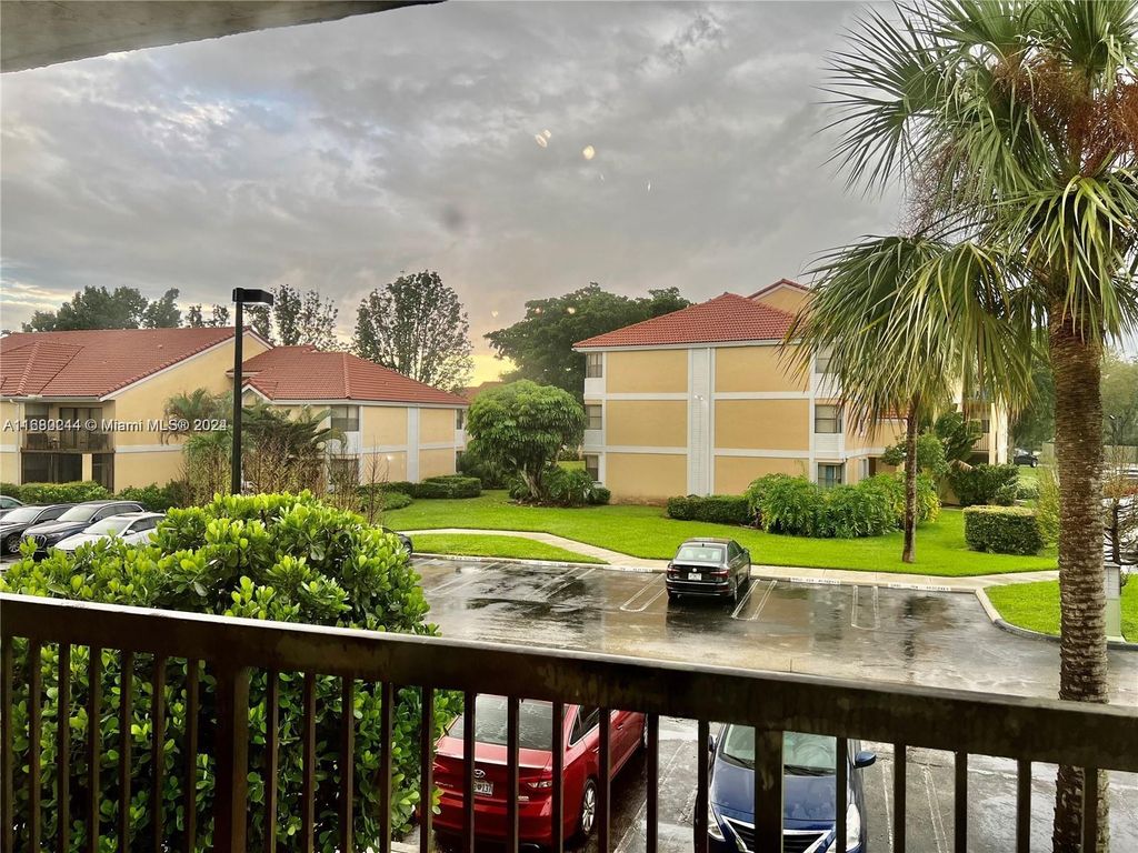 Photo of 5801 Riverside Dr #203B3, Coral Springs, FL 33067 (MLS # A11680244)