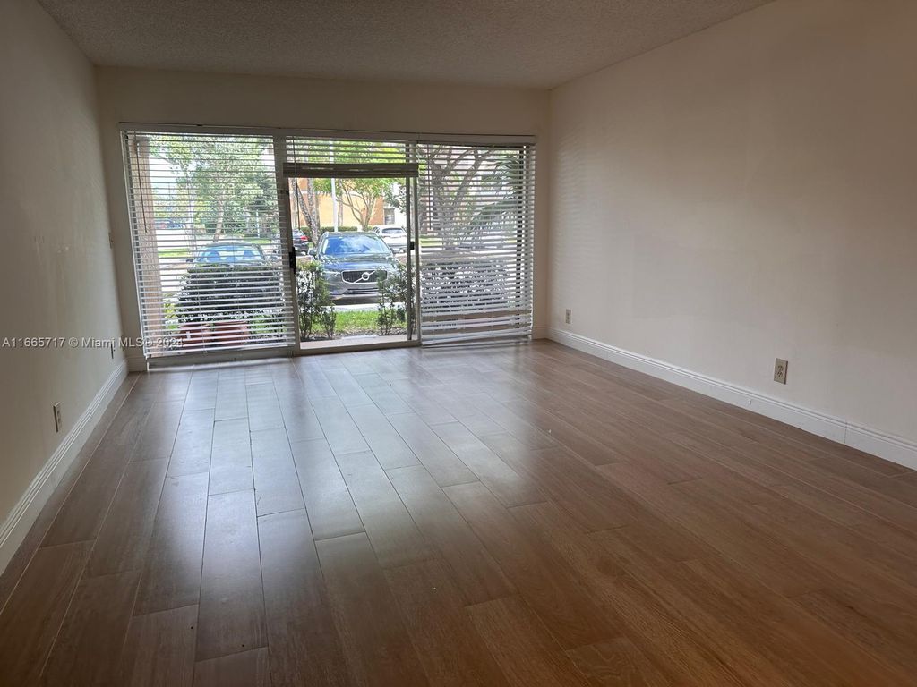 Photo of 8891 Wiles Rd #101, Coral Springs, FL 33067 (MLS # A11665717)