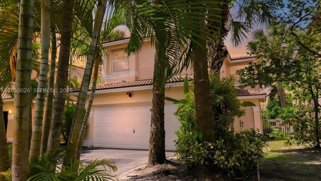 Photo of 9847 Fairway Cove Ln, Plantation, FL 33324 (MLS # A12050026)