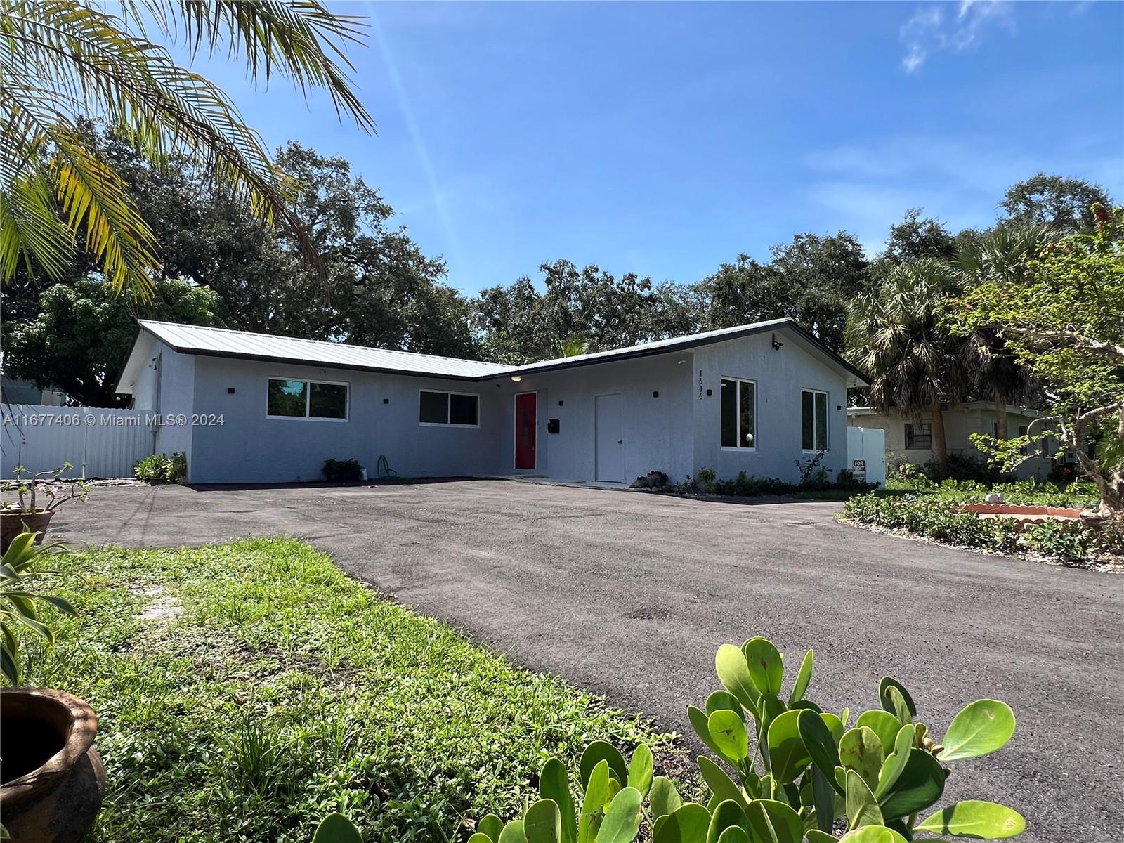 This property is a fully renovated smart house, equipped with a cutting-edge camera system for enhanced security. It features newly renovated bathrooms, impact-resistant doors and windows, and updated water and electrical systems. The house also boasts a durable metal roof and a beautiful backyard with fruit trees, perfect for outdoor enjoyment. Located conveniently near popular stores like Publix, Costco, Target, and other major supermarkets, this home provides easy access to shopping and essential services.