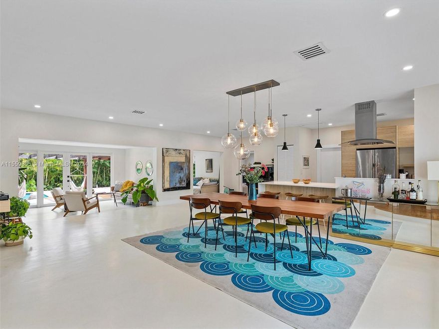 Welcome to your dream home located in East Miami Shores, a highly sought-after Miami neighborhood which features 3 bedrooms plus a den/office, 3 full bathrooms, high ceilings and 2,128 SF of interior space. In addition to the open layout with stunning views of the pool and lush backyard, the living space also has an updated open kitchen with quartz countertops and a large island perfect for entertaining. One of the property’s highlights is a spacious master bedroom with a walk-in closet and a master bathroom with a double sink vanity and a large glass shower/ roman tub combination. This home sits on a 10,938 SF lot at the end of a quiet street and includes an attached single-car garage. New roof, high impact windows & doors, A/C was replaced 2 years ago.