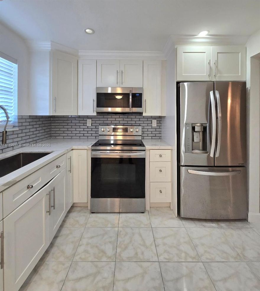 Centrally located for  easy commute in the  tri-county area,  this unit  is a perfect place to call Home.  Recently renovated with well thought out finishings.  Open floor plan to gather with family and friends.  Stainless Steel appliance package, washer and dryer in this unit offer a great convenience  benefit.  Ceramic tiles, neutral  and sophisticated countertops, remodeled showers,  2 huge closets in the master bedroom,  in addition to ample storage that is rare to find in a  condo.  Pride of ownership is truly reflected here.   

Thanks for showing this Listing