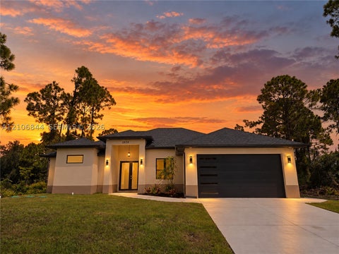 Photo of 2606 43rd St W, Lehigh Acres, FL 33971 (MLS # A12106844)