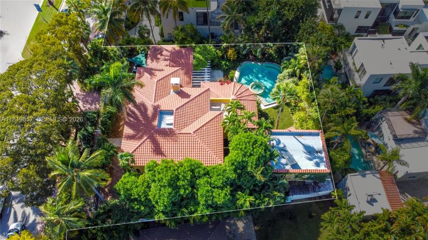 Now competitively repositioned to capture one of Miami Beach’s most compelling lifestyle opportunities. Behind gates on a rare 13,515 SF double lot, this 1929 Mediterranean estate offers over 5,300 SF and 6+ bedrooms of architectural character and flexibility—paired with something increasingly rare: true walkable access to Lincoln Road, Sunset Harbour, and the Venetian Causeway. Located steps from one of Miami Beach’s most vibrant neighborhoods, dining, wellness, shopping, and everyday conveniences are just minutes away. Over 20 restaurants and cafés, yoga and fitness studios, three grocery stores, and the new Whole Foods opening one block away create an unmatched lifestyle location. Inside, soaring ceilings and original red oak floors blend timeless architecture with updated comfort. Marble baths, an updated kitchen, a new roof, and a saltwater pool complete the offering, while the expansive tropical backyard creates a rare private retreat so close to Sunset Harbour. The fully renovated detached guesthouse adds exceptional flexibility: • Pool-level studio ideal for a lounge, gym, office, or creative space • Separate upper-level apartment perfect for an au pair, nanny, extended family, or rental income. For buyers seeking estate-scale space without sacrificing walkability, this opportunity stands apart.