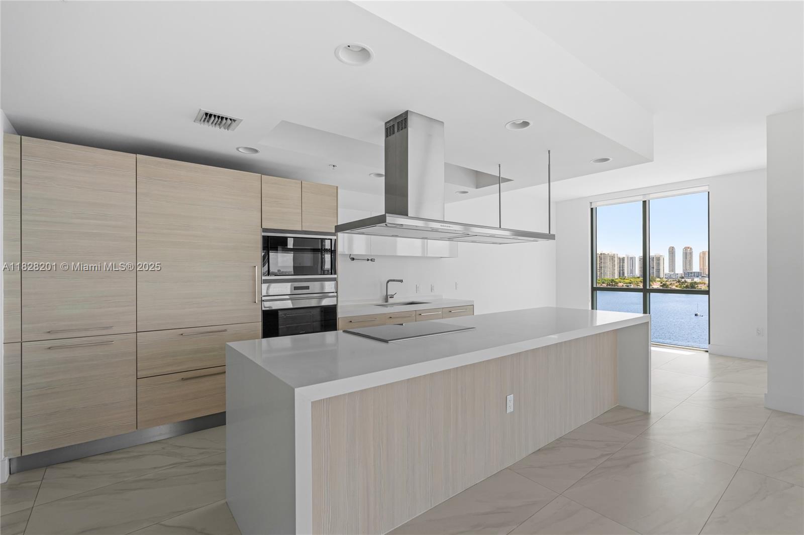 Experience unparalleled luxury in this stunning 3-bedroom, 3.5-bathroom residence boasting breathtaking views
of the bay and ocean. Featuring sophisticated Snaidero cabinetry paired with premium appliances by Miele,
Subzero, and Bosch, every detail is designed to impress. Set within an exclusive building offering world-class
amenities, this home promises both elegance and comfort.
