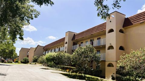 Photo of 2741 N Pine Island Rd #108, Sunrise, FL 33322 (MLS # A11849199)