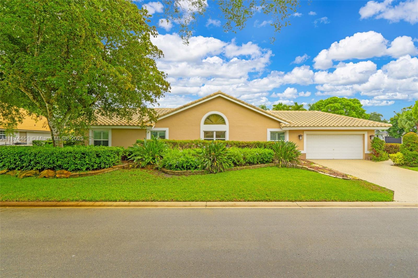 Welcome to this beautifully maintained 5-bed, 3-bath home in guard-gated Eagle Trace. Features include a triple-split floor plan, updated kitchen with granite & island, spacious primary suite with dual walk-ins and spa-like bath. Enjoy paid-off solar panels, 2022 A/C, impact windows/doors, new water heater, saltwater pool, alarm & 2012 roof. Relax in the screened pool, covered patio & fenced yard. Tax amount reflects upgrades (impact windows/doors & solar panels), which sellers will pay off at closing—taxes will be reduced. Community offers 24-hr security, tennis, basketball, pickleball & playground.