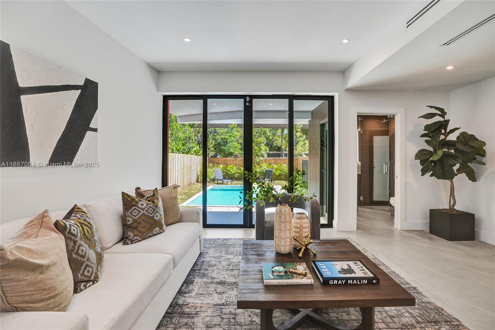 Welcome to HIZUMI, where artistic vision meets luxurious living. Named after the Japanese word for "distorted," this avant-garde townhome in The Roads challenges convention with its uniquely twisted design. Like a piece of architectural poetry, HIZUMI's innovative layout creates unexpected nooks and panoramas, inviting you to see Miami life from a fresh perspective.
Sun-drenched spaces flow seamlessly from indoors to out, culminating in a private pool oasis perfect for entertaining or quiet reflection. Nearby, The Underline beckons for morning jogs or evening strolls, connecting you to Miami's vibrant pulse.
HIZUMI offers more than a home, it's your personal masterpiece in the heart of Miami.