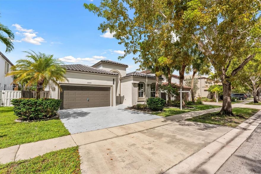 BRAND NEW ROOF + AC | Fully Renovated | Resort-Style Living. Skip the big-ticket worries, this home already has a brand-new roof and brand-new AC. Inside, fresh paint, smooth ceilings, recessed lighting, and designer fixtures create a modern, airy vibe. The kitchen shines with an extended quartz snack bar, stainless steel appliances, and open flow to the living spaces. Bathrooms are stylishly updated, and even the garage boasts a new motor and full service. All of this is in a gated, 24/7 monitored community loaded with amenities: resort-style pool, kiddie pool, spa, fitness center, basketball and tennis courts, pickleball, playgrounds, fishing dock, and more; All minutes from I-75, the Turnpike, top-rated schools, and endless shopping. Move in, unpack, and start living your dream.