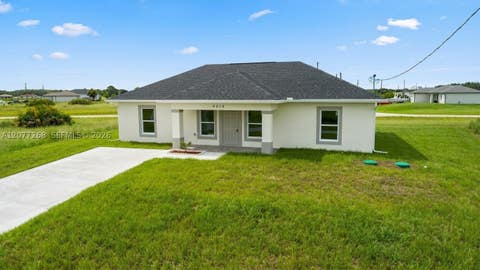 Photo of 9019 E Crow Cir, La Belle, FL 33935 (MLS # A12077268)