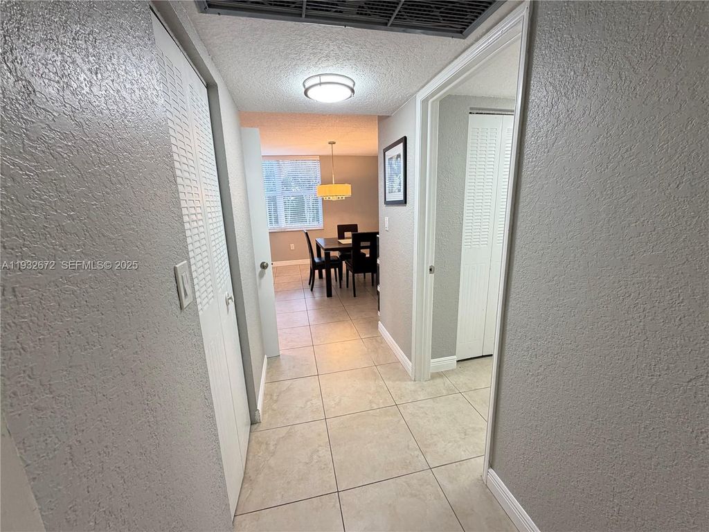 Photo of 9491 Evergreen Pl #201, Davie, FL 33324 (MLS # A11932672)