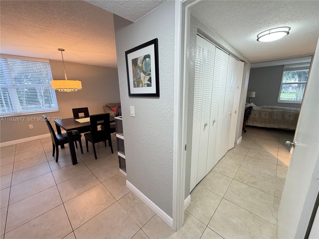 Photo of 9491 Evergreen Pl #201, Davie, FL 33324 (MLS # A11932672)