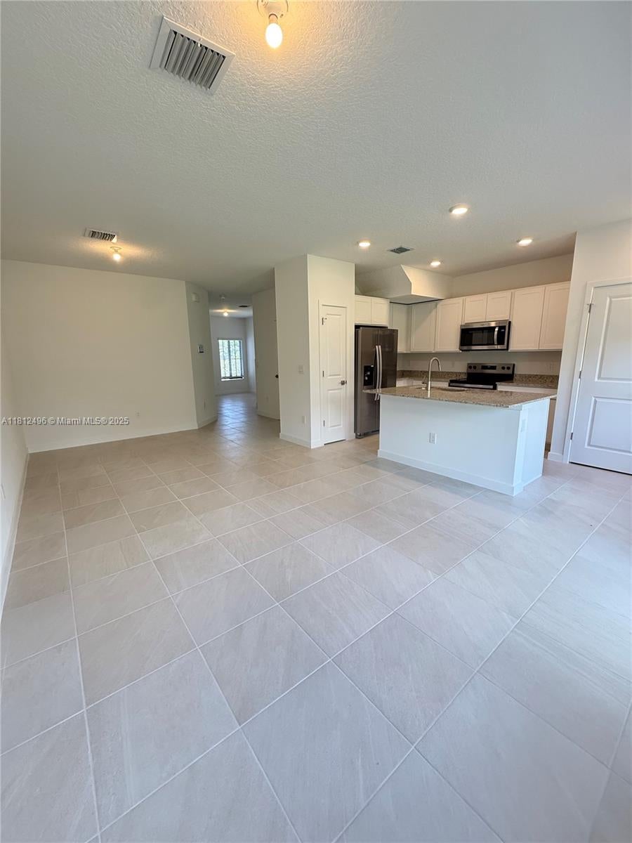 Photo of 5044 Gooseberry St #0, Haverhill, FL 33415 (MLS # A11812496)