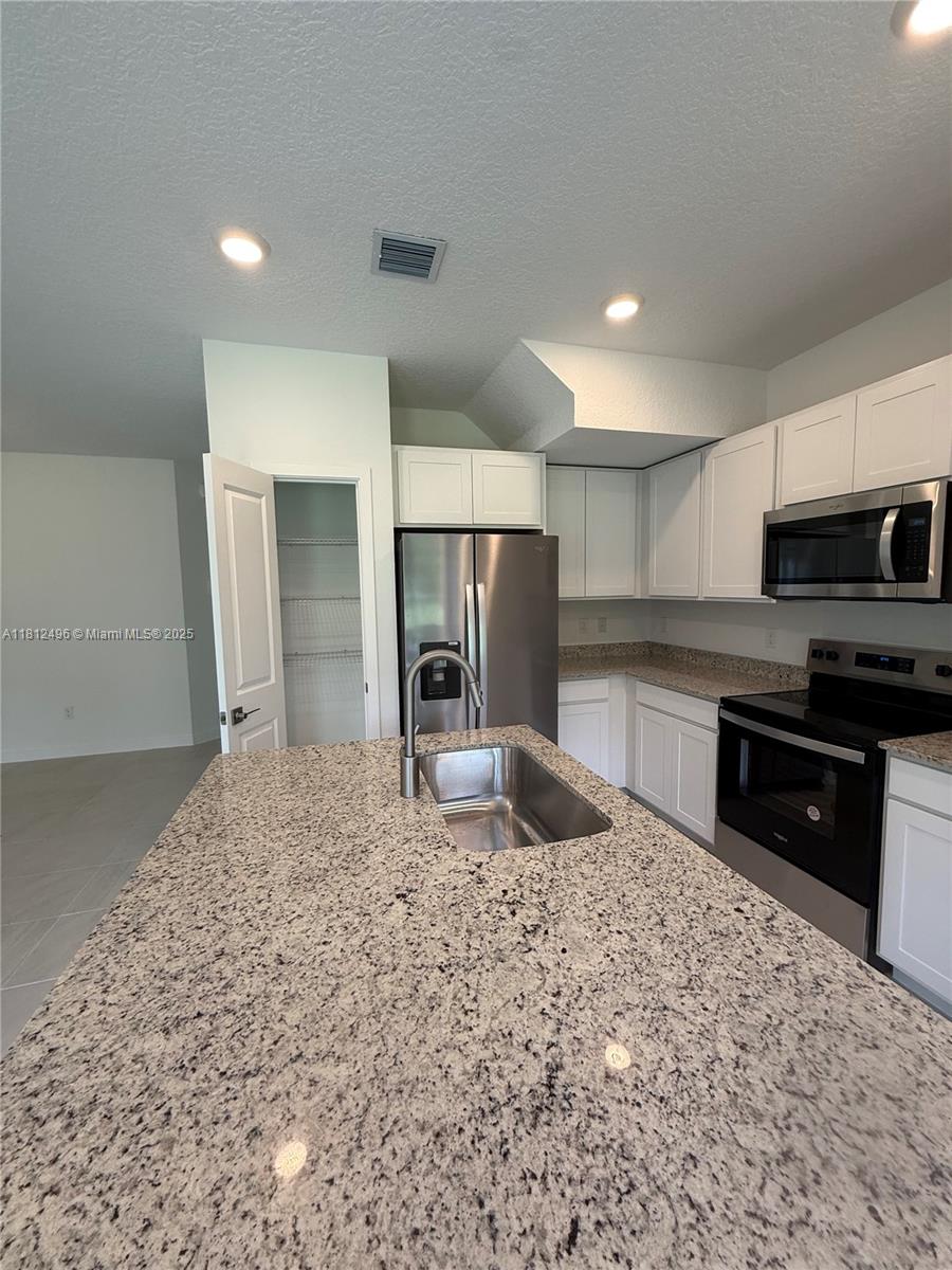Photo of 5044 Gooseberry St #0, Haverhill, FL 33415 (MLS # A11812496)