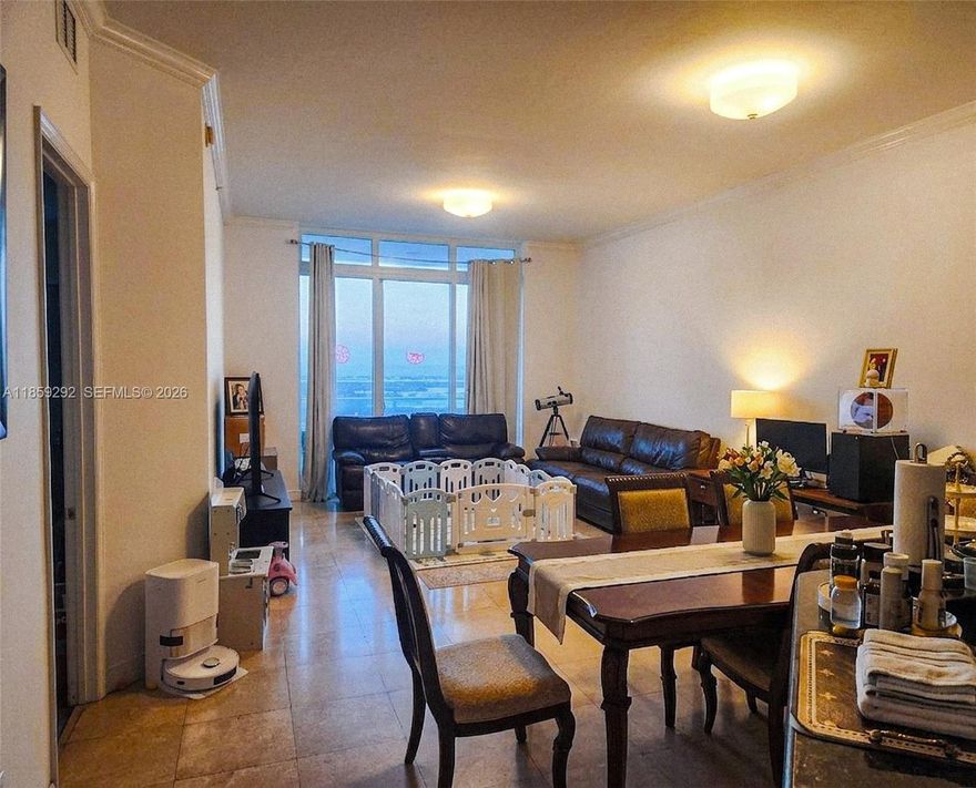 PENTHOUSE! Gorgeous UNOBSTRUCTED VIEWS of Oleta, Intracoastal, & ocean from this large 3-bed/3-bath home. NEW Fridge/ NEW Laundry&Dryer / NEW AC Unit. 1,801 sqft of an open floor plan w/ tile and natural stone floors. Primary bedroom an en-suite bathroom jacuzzi tub & walk-in closet. Assigned Parking spot on the FIRST floor of the garage. Be the first to enjoy the newly installed glass balcony. Building offers fantastic amenities including heated pool, gym, tennis court, playground, and dog washing station. Can pay for 2nd parking spot. Reserve Paddle, Costco, Pura Vida, Target, Publix, new Mater Academy, UM Health, all within a mile & beaches 10 min. away.