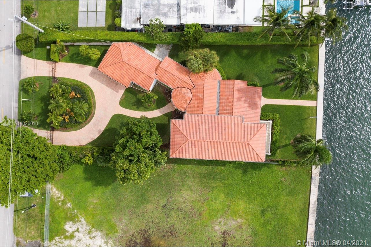 New 2021 Waterfront Home Listing on Bay Drive.
One of the last Opportunities in this Area. The Best Panoramic Water Views in a charming House. Enjoy sublime Sunsets and enchanting Sunrises. This two-story 5 bedroom 5 bath home on a huge 13,000 sq. ft. lot, with 77 feet of waterfront, filled with incredibly beautiful daylight, high ceilings and Art Deco moldings, gas fireplace, large bedrooms, main bedrooms up and down. Kitchen and baths have been renovated plus impact windows, 2 car garage, and a large outdoor patio overlooking the fabulous Biscayne Bay. Ready to move in!
Won't last long in this Market!