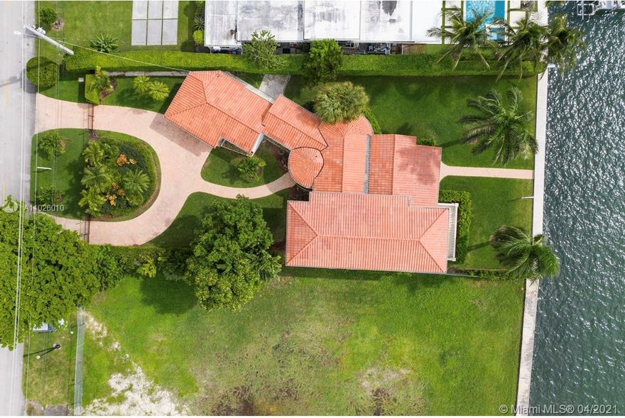 New 2021 Waterfront Home Listing on Bay Drive. 
One of the last Opportunities in this Area. The Best Panoramic Water Views in a charming House. Enjoy sublime Sunsets and enchanting Sunrises. This two-story 5 bedroom 5 bath home on a huge 13,000 sq. ft. lot, with 77 feet of waterfront, filled with incredibly beautiful daylight, high ceilings and Art Deco moldings, gas fireplace, large bedrooms, main bedrooms up and down. Kitchen and baths have been renovated plus impact windows, 2 car garage, and a large outdoor patio overlooking the fabulous Biscayne Bay. Ready to move in! 
Won't last long in this Market!