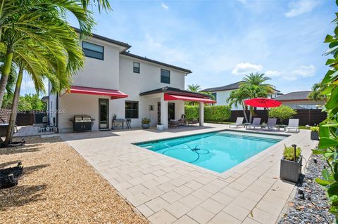 Photo of 8915 NW 161st Ter, Miami Lakes, FL 33018 (MLS # A12016852)