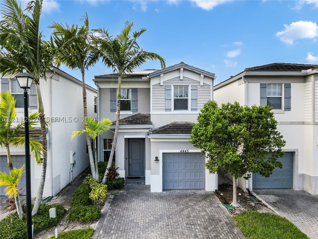Photo of 4445 NW 48th Ter, Tamarac, FL 33319 (MLS # A12112628)