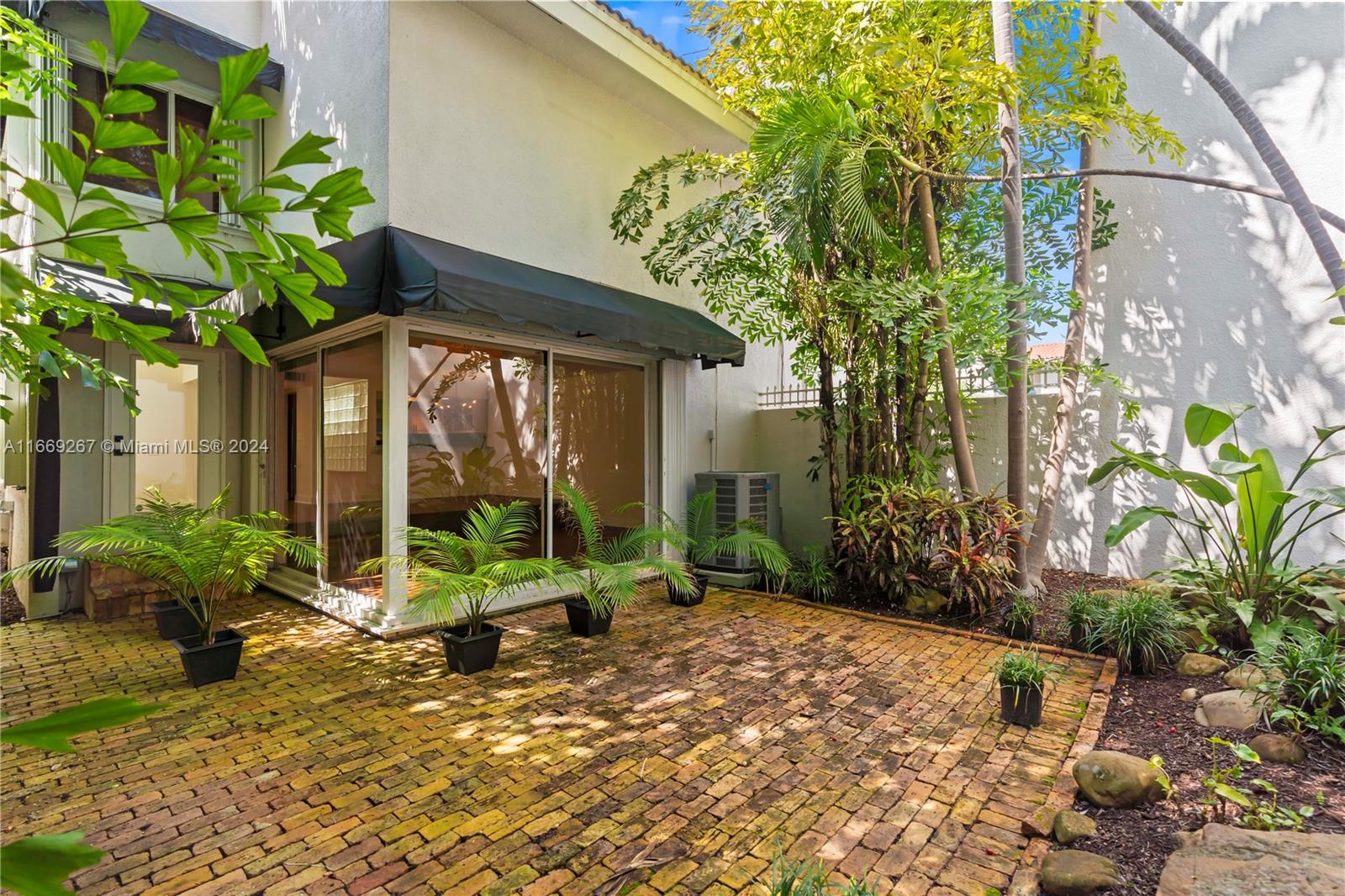 HOME IN THE GROVE CONDO - Residential Lease