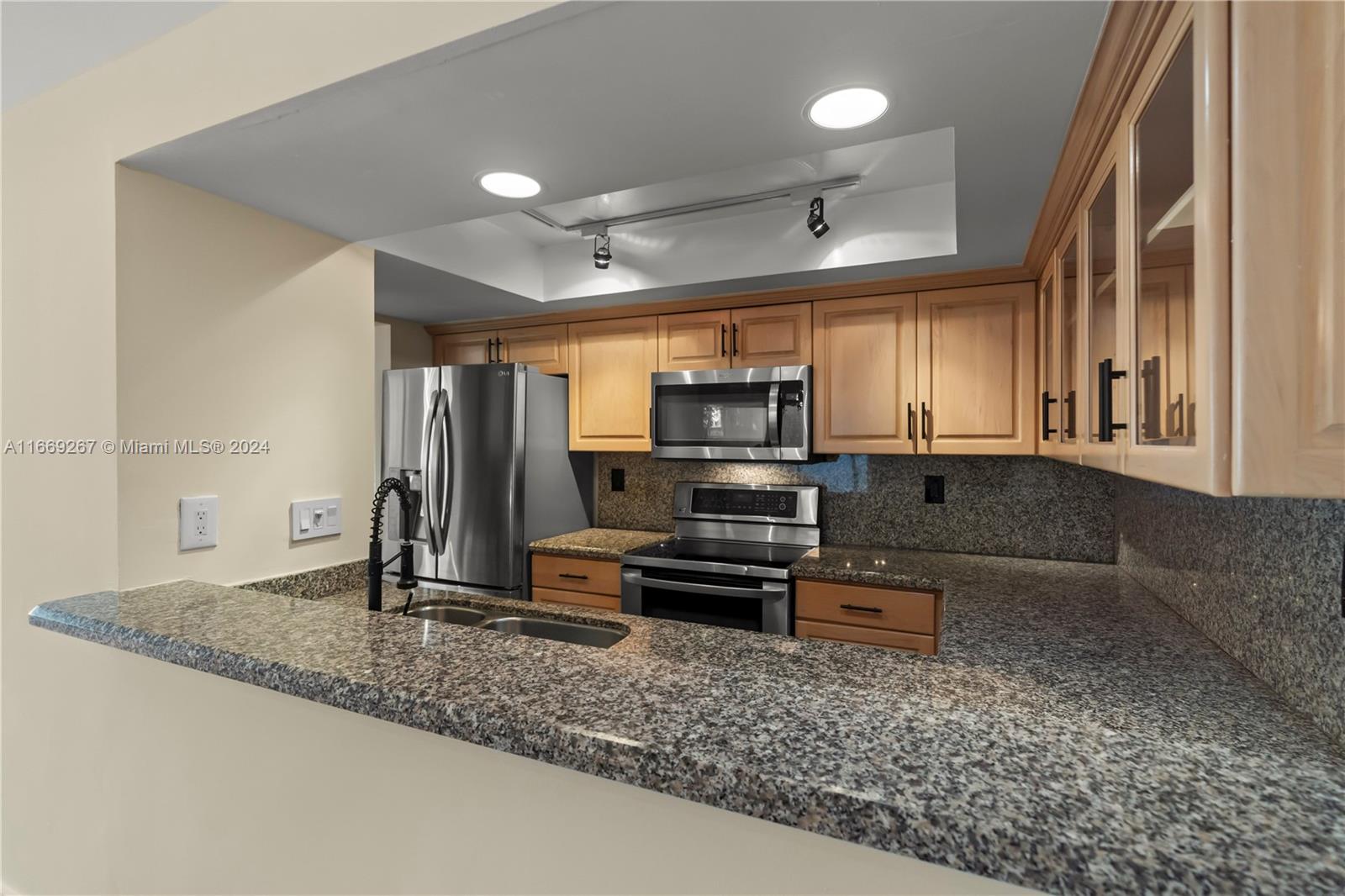 HOME IN THE GROVE CONDO - Residential Lease