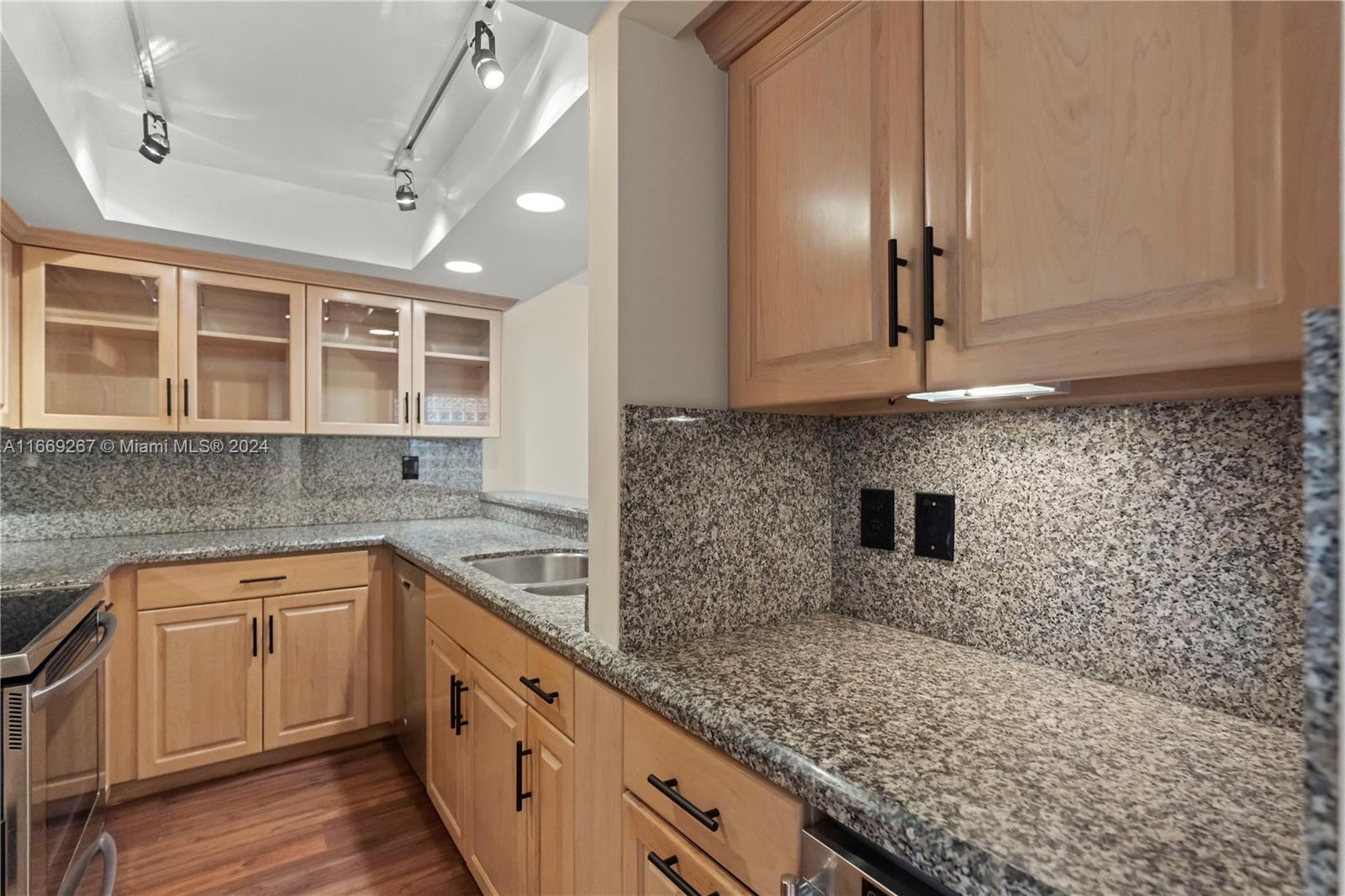 HOME IN THE GROVE CONDO - Residential Lease